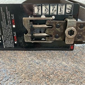 Belt 686 size: S/M 26”-38” New. Color camouflage brown/green